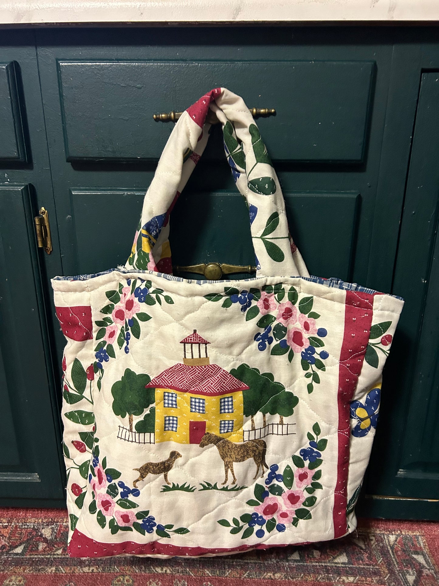 The schoolhouse quilted tote bag