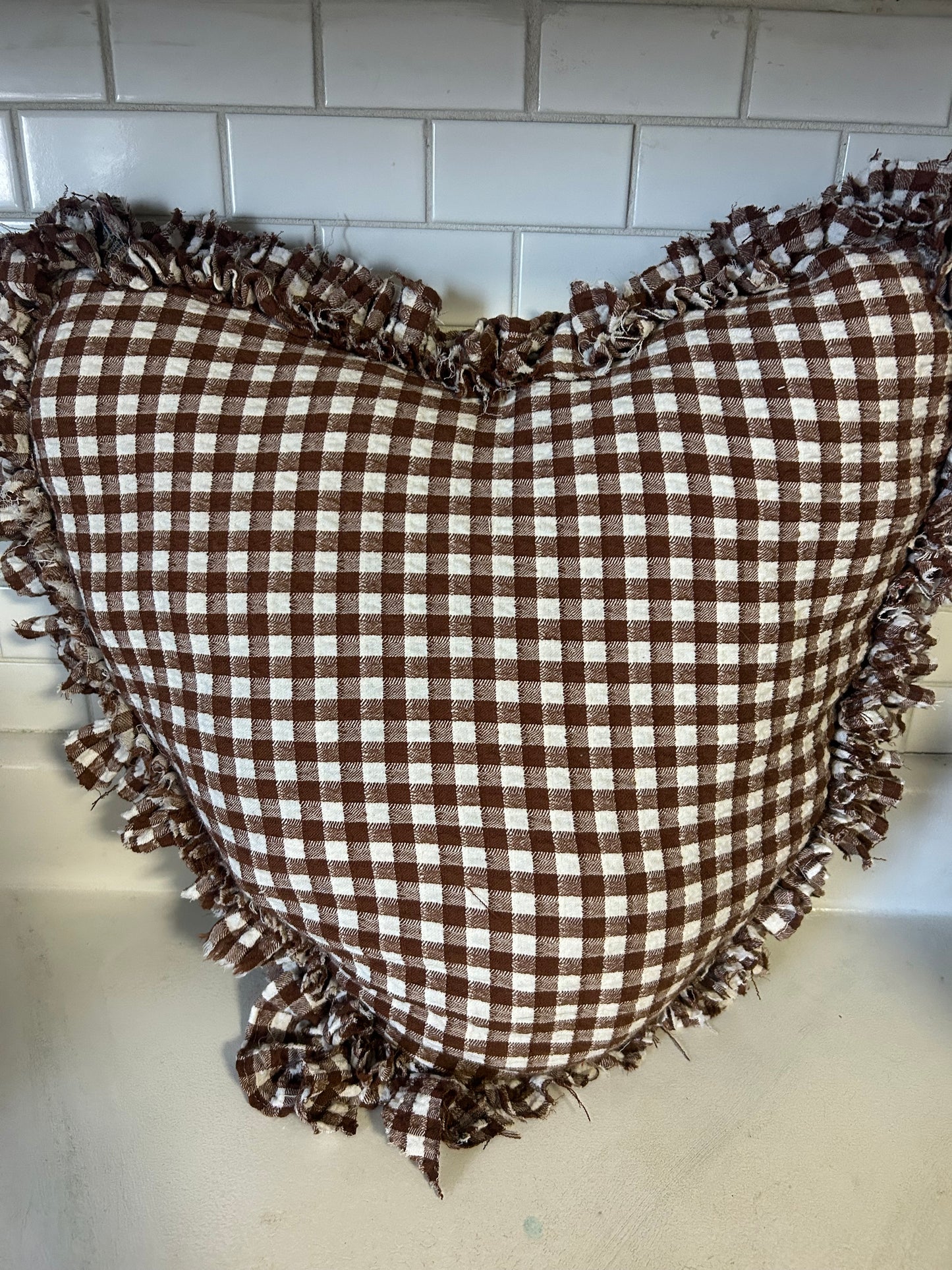 Large brown heart pillow